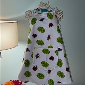 Child apron in teal and ladybug print NWT